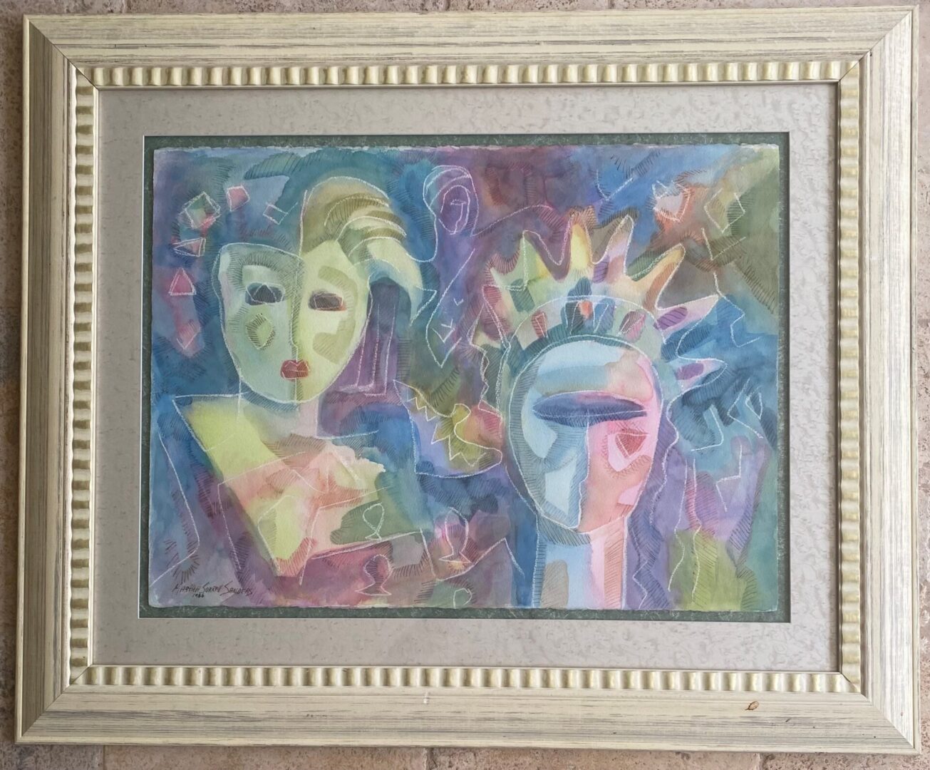 A painting of two faces in a frame