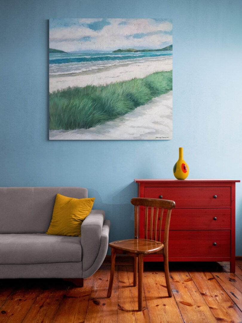 A living room with blue walls and a painting on the wall showcasing local fine art for sale.