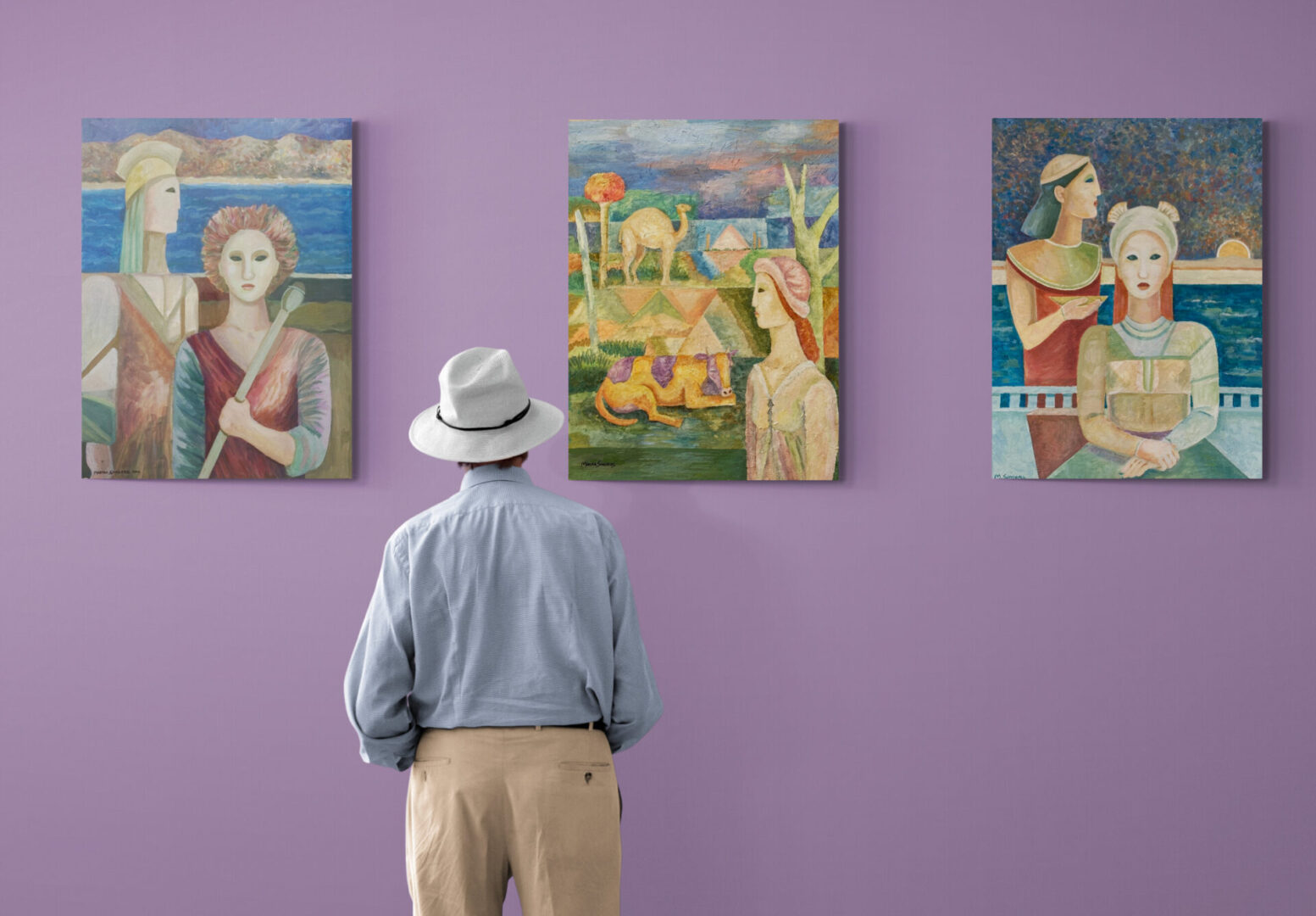 A man admiring local fine art for sale displayed on a vibrant purple wall.