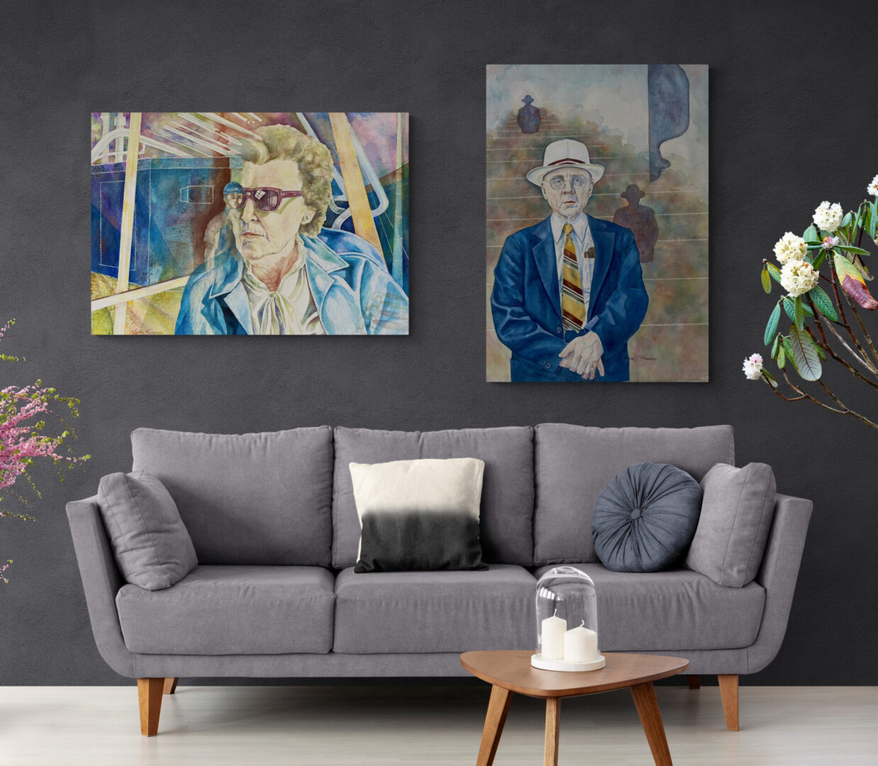 Two local fine art paintings hanging above a couch in a living room, available for sale.